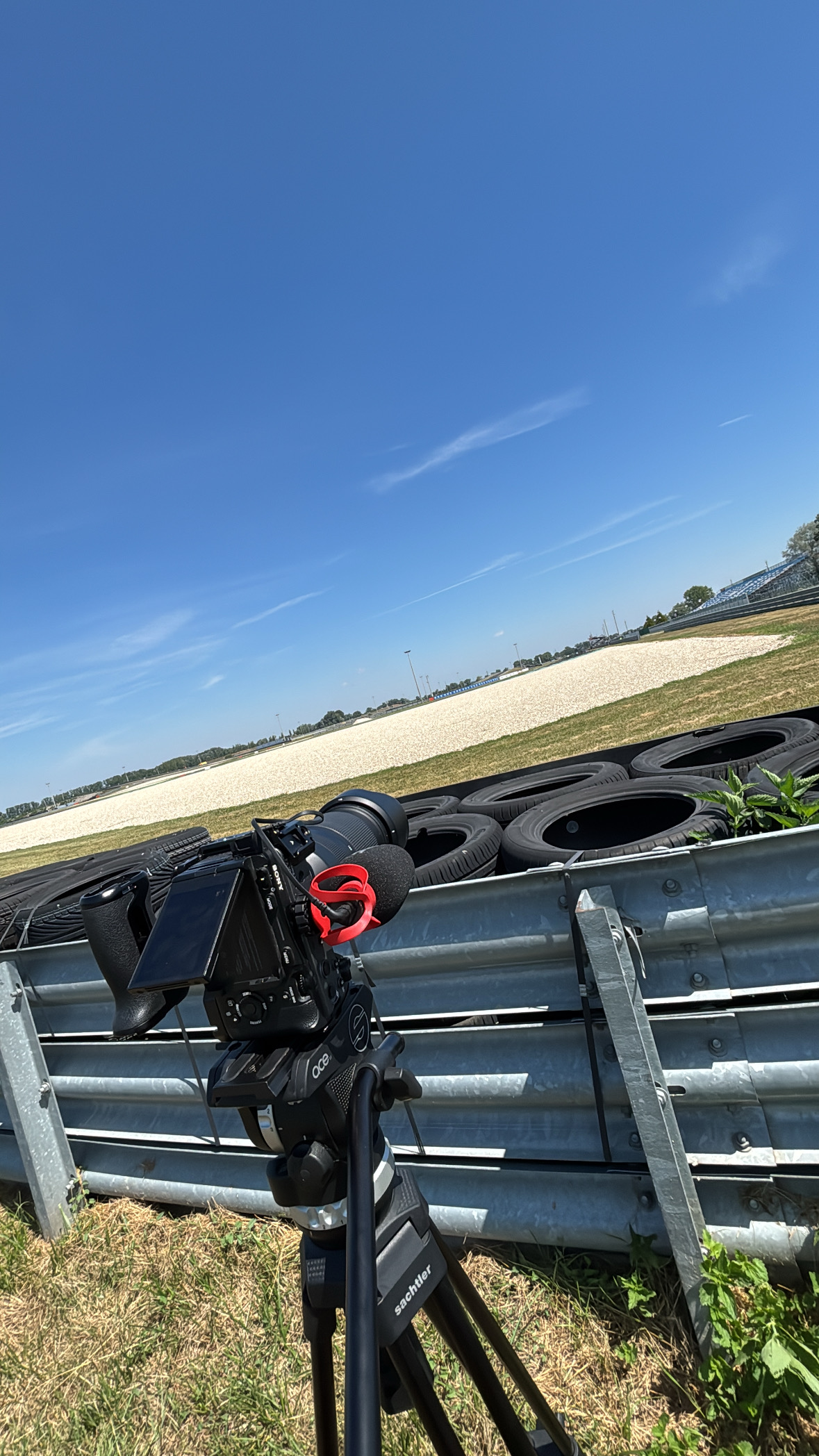 Camera set up beside a race track